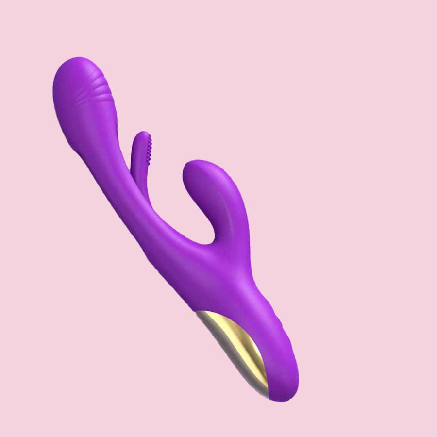 Hollow-out sucking and slapping vibrator